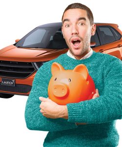 man holding piggy bank with car in the background
