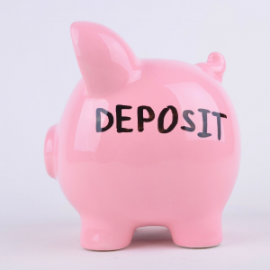 A pink piggy bank | Deposit