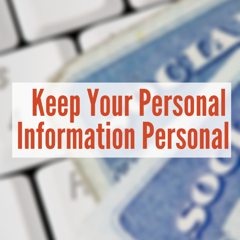 social security cards sitting on keyboard | Keep Your Personal Information Personal
