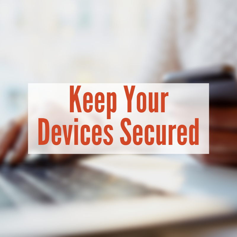 person holding credit card and typing on computer | Keep Your Devices Secured