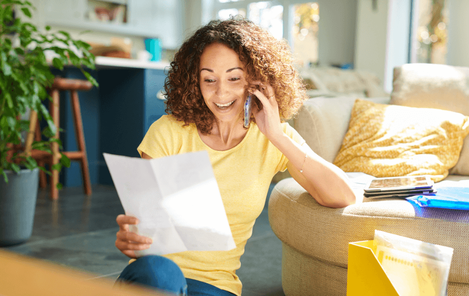 person on the phone to negotiate their bill