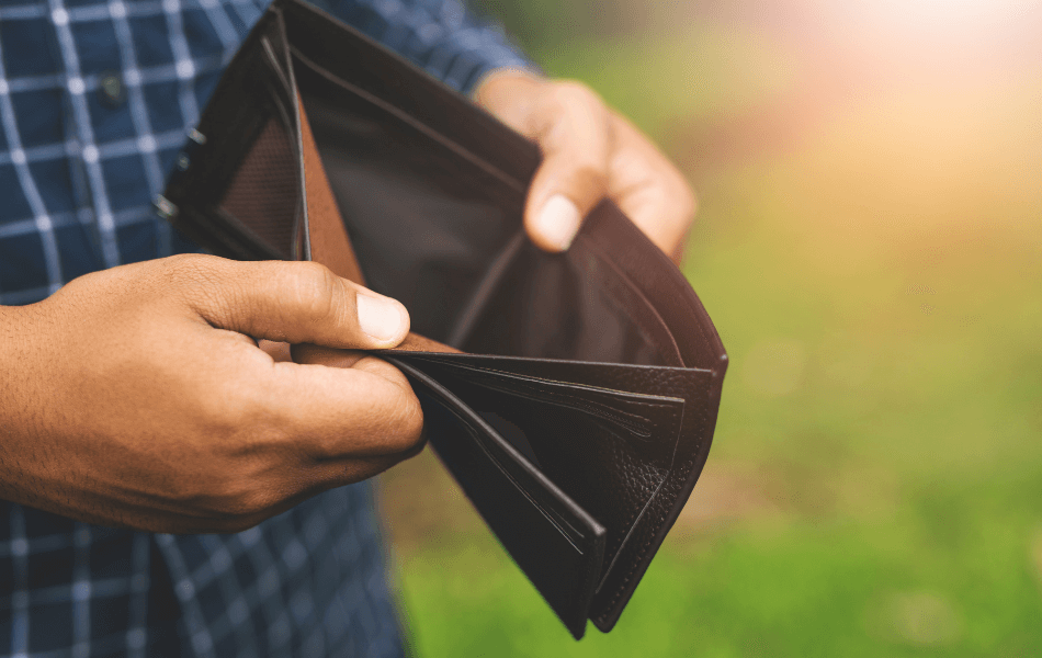 Person holding open an empty wallet