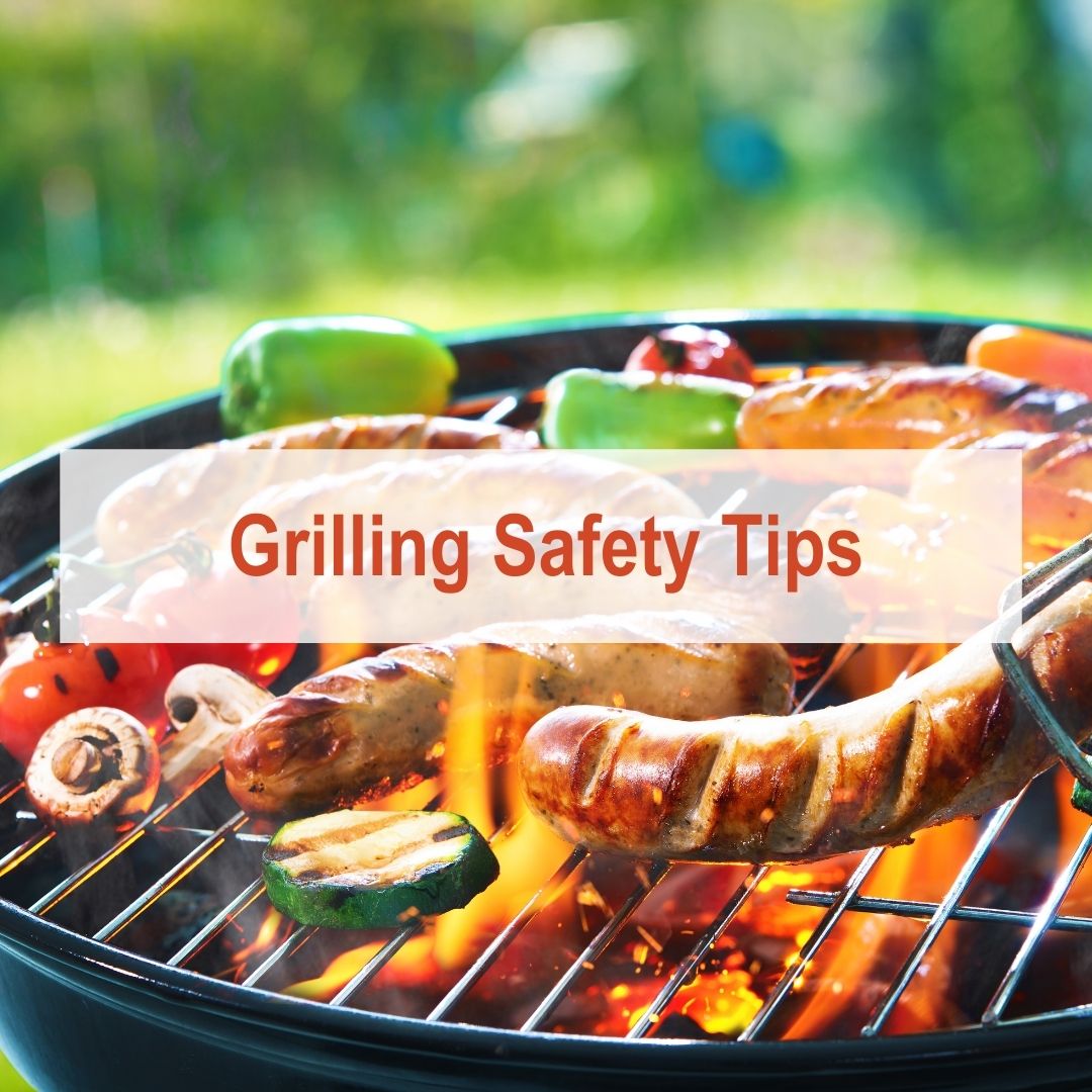 a grill filled with meat and veggies | Grilling Safety Tips