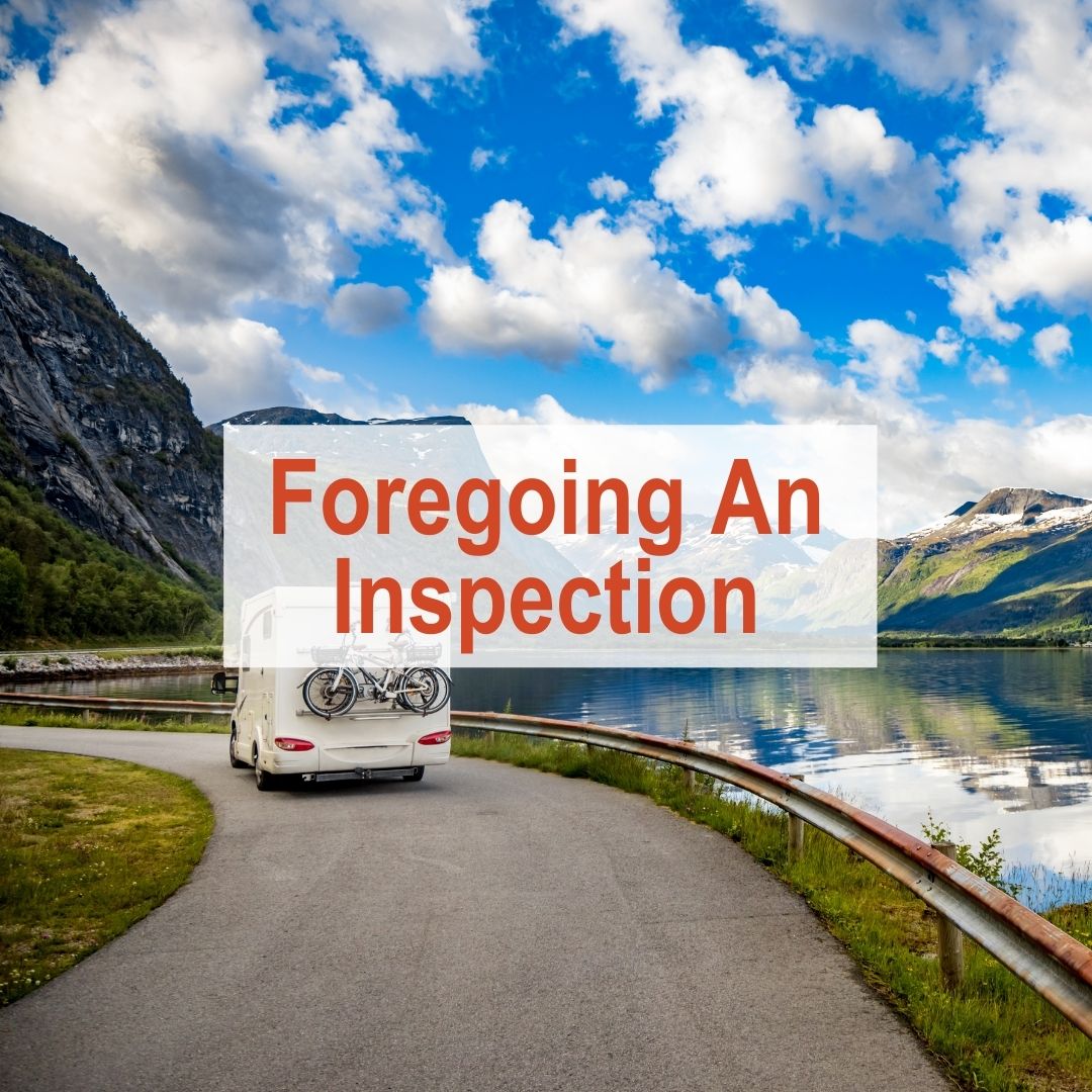 Rv driving along road next to lake | Foregoing an inspection